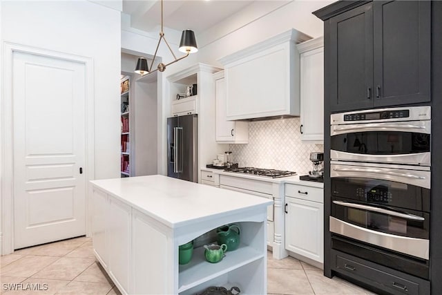 kitchen with white cabinetry, open shelves, and appliances with stainless steel finishes