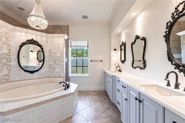 bathroom with a bath, ornamental molding, a sink, and a chandelier