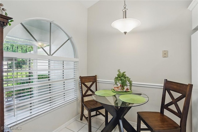 6103 Thresher Dr Unit 102, Naples, FL 34112 - dining space with light tile patterned floors and baseboards
