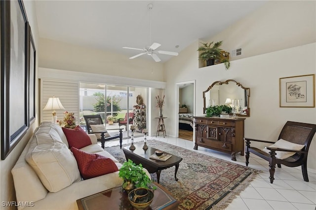 6103 Thresher Dr Unit 102, Naples, FL 34112 - living room featuring ceiling fan, light tile patterned floors, and high vaulted ceiling