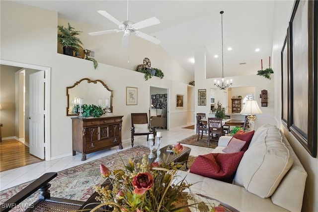 6103 Thresher Dr Unit 102, Naples, FL 34112 - tiled living room with high vaulted ceiling, a chandelier, a ceiling fan, recessed lighting, and baseboards
