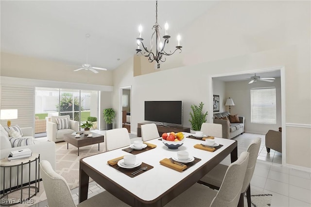 6103 Thresher Dr Unit 102, Naples, FL 34112 - dining area with ceiling fan, light tile patterned flooring, high vaulted ceiling, and a chandelier