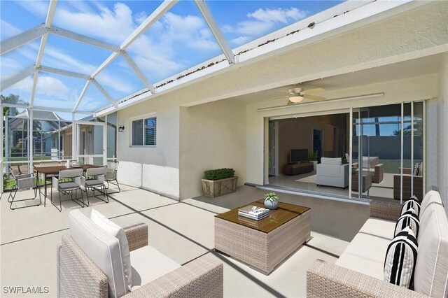 6103 Thresher Dr Unit 102, Naples, FL 34112 - view of patio / terrace featuring outdoor dining space, an outdoor hangout area, ceiling fan, and a lanai