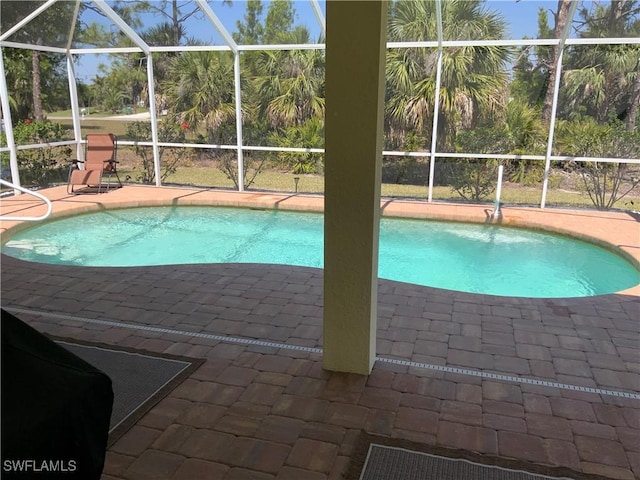 3817 NW 46th St, Cape Coral, FL 33993 - swimming pool featuring a lanai and a patio area