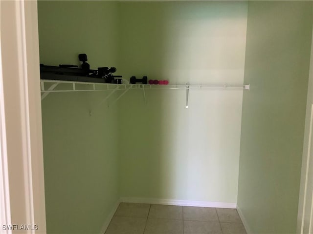 3817 NW 46th St, Cape Coral, FL 33993 - spacious closet with light tile patterned floors