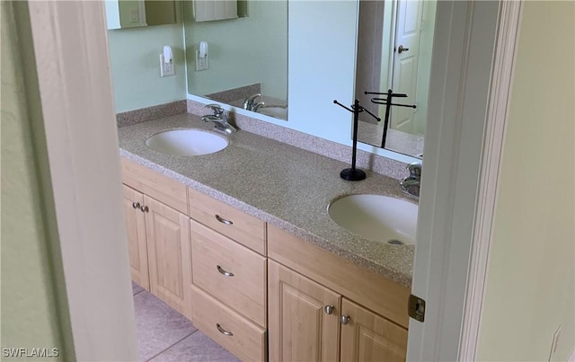 3817 NW 46th St, Cape Coral, FL 33993 - bathroom featuring double vanity and tile patterned floors