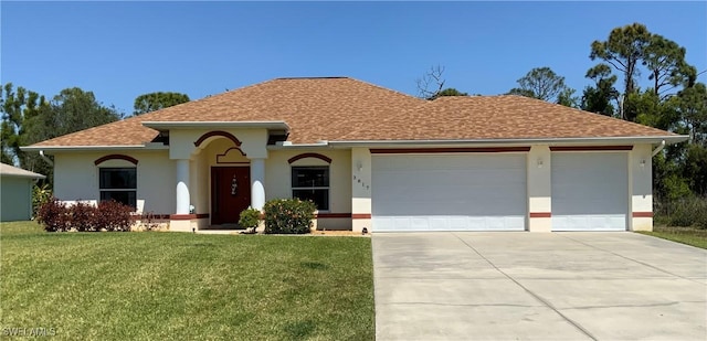 3817 NW 46th St, Cape Coral, FL 33993 - view of front of home featuring concrete driveway, a garage, a front lawn, roof with shingles, and stucco siding