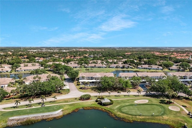 bird's eye view featuring a water view, view of golf course, and a residential view