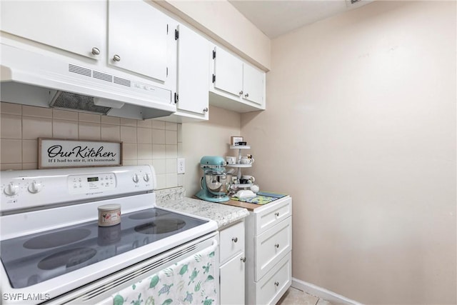 kitchen with light countertops, tasteful backsplash, white electric range oven, under cabinet range hood, and white cabinets