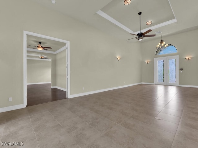 866 Cal Cove Dr, Fort Myers, FL 33919 - empty room featuring visible vents, a raised ceiling, crown molding, ceiling fan with notable chandelier, and tile patterned floors