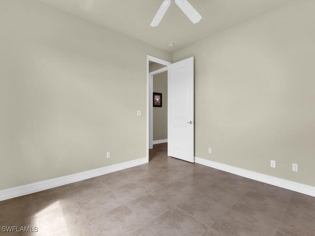 866 Cal Cove Dr, Fort Myers, FL 33919 - empty room with baseboards and a ceiling fan