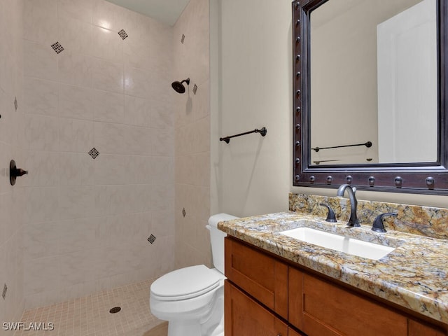 866 Cal Cove Dr, Fort Myers, FL 33919 - full bathroom with toilet, tiled shower, and vanity