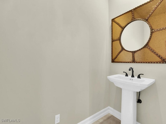866 Cal Cove Dr, Fort Myers, FL 33919 - bathroom featuring baseboards