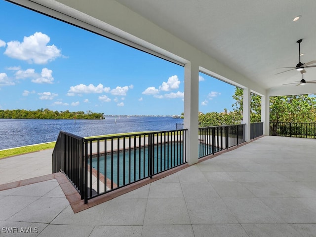 866 Cal Cove Dr, Fort Myers, FL 33919 - balcony with ceiling fan, a patio area, and a water view