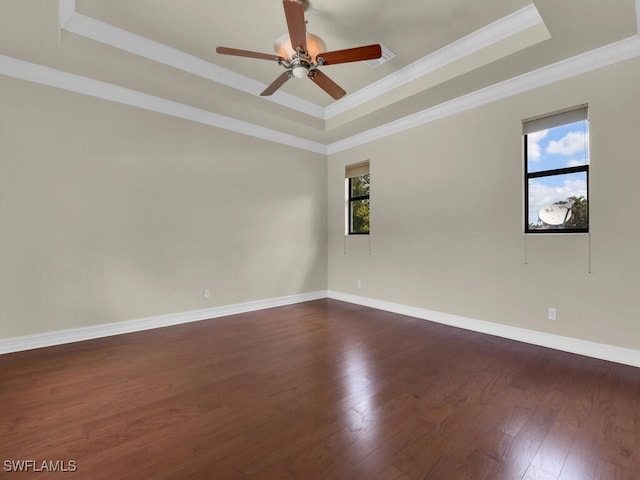 866 Cal Cove Dr, Fort Myers, FL 33919 - spare room with a wealth of natural light, dark wood-type flooring, a tray ceiling, and ceiling fan