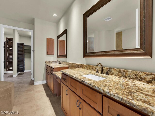 866 Cal Cove Dr, Fort Myers, FL 33919 - full bath featuring vanity, baseboards, recessed lighting, tile patterned floors, and visible vents