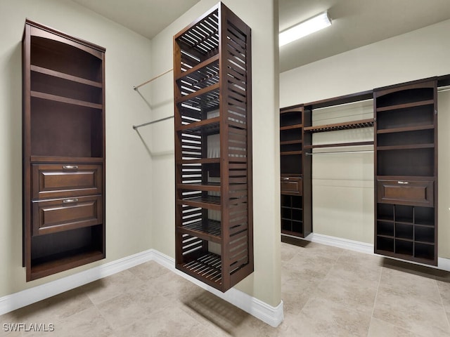 866 Cal Cove Dr, Fort Myers, FL 33919 - spacious closet with light tile patterned floors