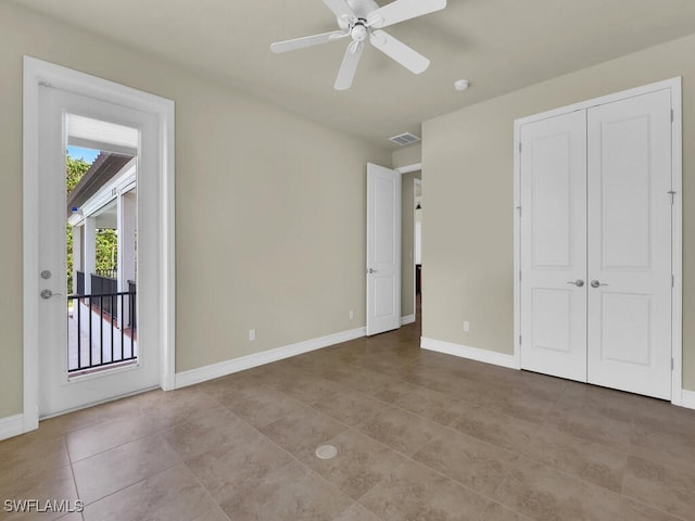 866 Cal Cove Dr, Fort Myers, FL 33919 - unfurnished bedroom featuring a ceiling fan, tile patterned flooring, visible vents, access to exterior, and baseboards