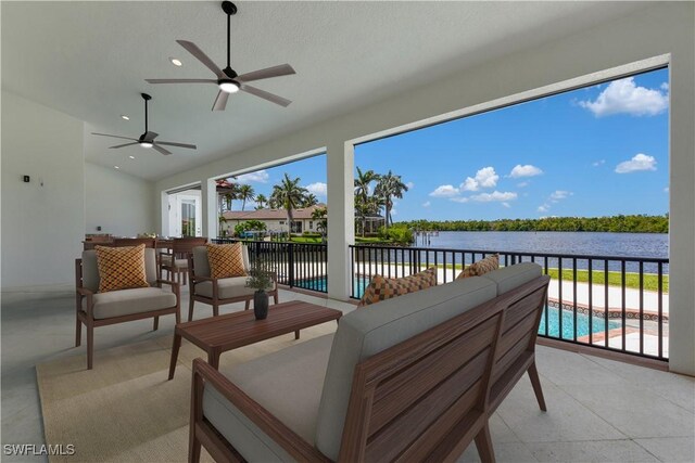 866 Cal Cove Dr, Fort Myers, FL 33919 - view of patio with a water view, a fenced in pool, an outdoor hangout area, and ceiling fan