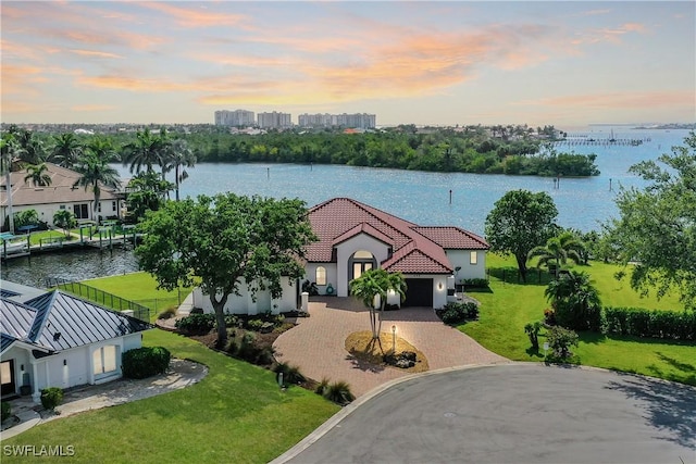 866 Cal Cove Dr, Fort Myers, FL 33919 - aerial view at dusk featuring a water view