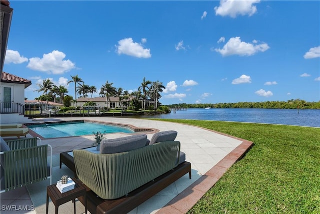 866 Cal Cove Dr, Fort Myers, FL 33919 - pool with a water view, a patio area, and a lawn