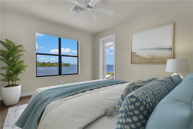 866 Cal Cove Dr, Fort Myers, FL 33919 - bedroom with access to outside, visible vents, a water view, wood finished floors, and baseboards
