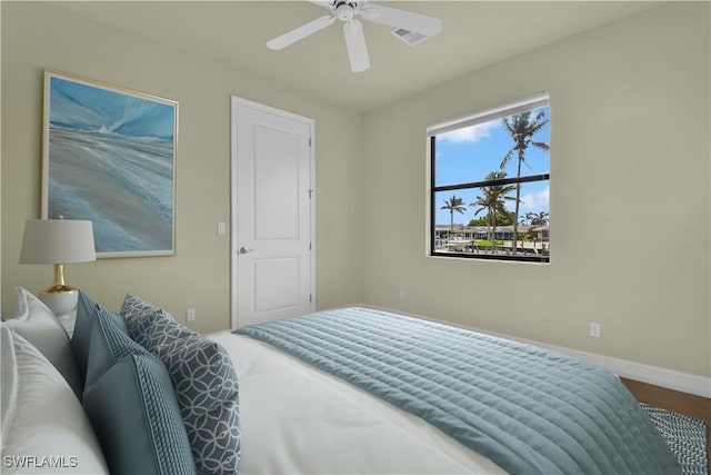866 Cal Cove Dr, Fort Myers, FL 33919 - bedroom with baseboards and ceiling fan