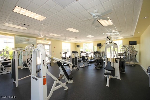 14543 Abaco Lakes Dr Unit 103, Fort Myers, FL 33908 - exercise room featuring a ceiling fan and a paneled ceiling