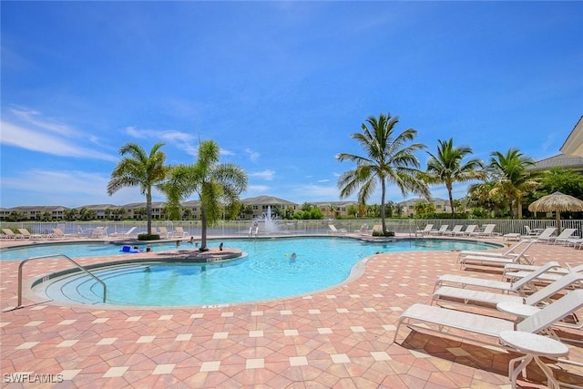 14543 Abaco Lakes Dr Unit 103, Fort Myers, FL 33908 - community pool featuring fence and a patio area