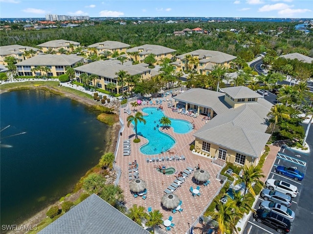 14543 Abaco Lakes Dr Unit 103, Fort Myers, FL 33908 - drone / aerial view of a pool and a nearby body of water