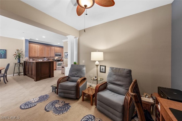 14543 Abaco Lakes Dr Unit 103, Fort Myers, FL 33908 - living area with ceiling fan, recessed lighting, decorative columns, baseboards, and light tile patterned floors