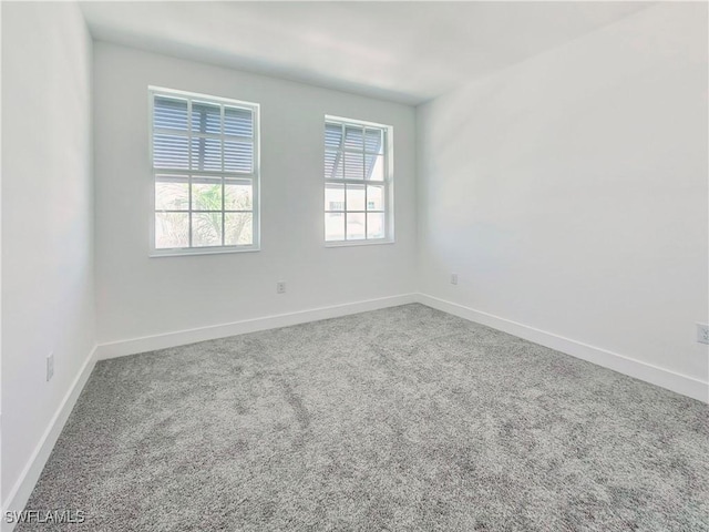 26330 Coco Cay Cir Unit 201, Bonita Springs, FL 34135 - carpeted empty room featuring baseboards