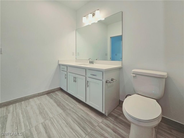 26330 Coco Cay Cir Unit 201, Bonita Springs, FL 34135 - bathroom featuring vanity and baseboards