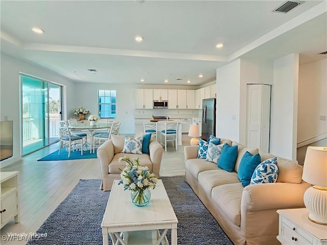26330 Coco Cay Cir Unit 201, Bonita Springs, FL 34135 - living area with light wood-style floors and recessed lighting
