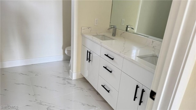 4802 Nora Ave N, Lehigh Acres, FL 33971 - full bathroom with marble look tile flooring and double vanity