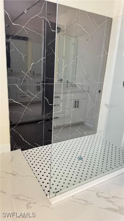 4802 Nora Ave N, Lehigh Acres, FL 33971 - bathroom with marble finish flooring and a marble finish shower