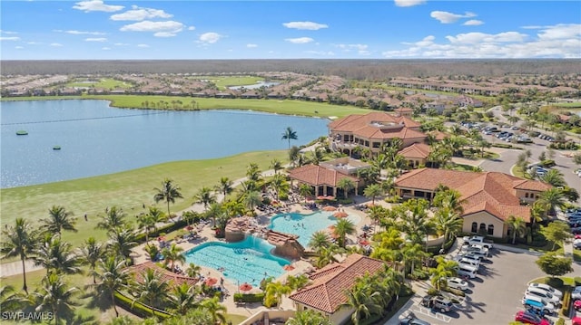 17991 Bonita National Blvd Unit 843, Bonita Springs, FL 34135 - aerial perspective of suburban area featuring a nearby body of water, a pool area, and a local golf course