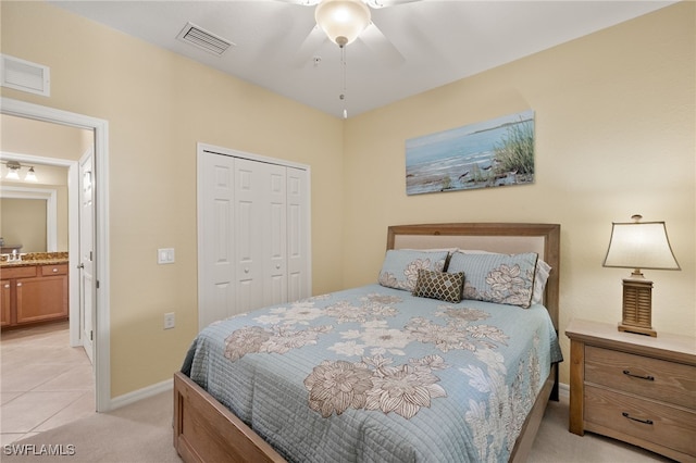 17991 Bonita National Blvd Unit 843, Bonita Springs, FL 34135 - bedroom featuring a closet, light colored carpet, baseboards, ceiling fan, and light tile patterned floors
