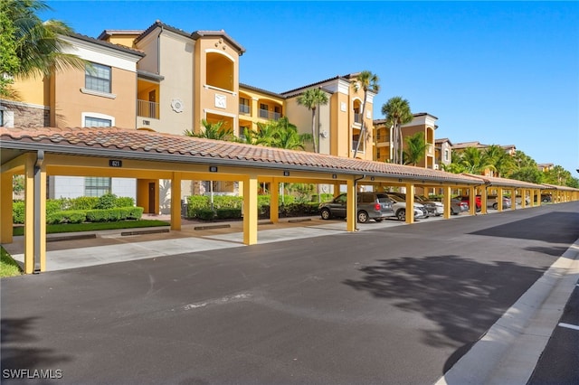 17991 Bonita National Blvd Unit 843, Bonita Springs, FL 34135 - view of building exterior with covered parking