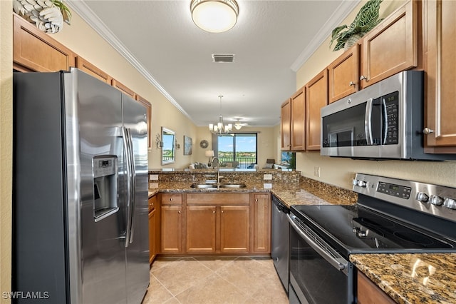 17991 Bonita National Blvd Unit 843, Bonita Springs, FL 34135 - kitchen featuring stainless steel appliances, a sink, crown molding, brown cabinetry, and light tile patterned floors