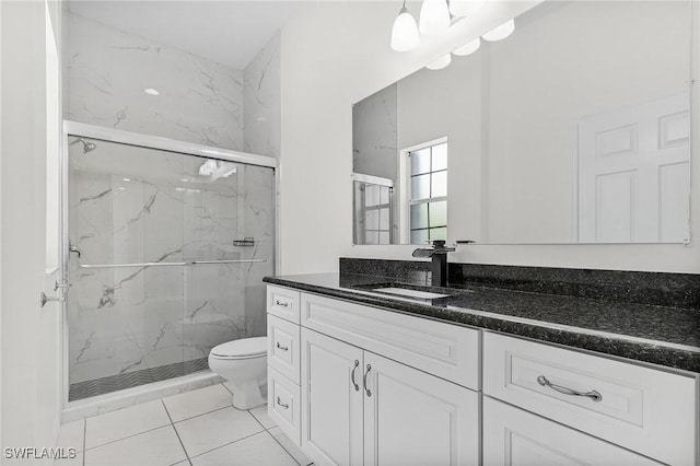 1207 SW 52nd Ter, Cape Coral, FL 33914 - bathroom with a marble finish shower, vanity, toilet, and tile patterned flooring