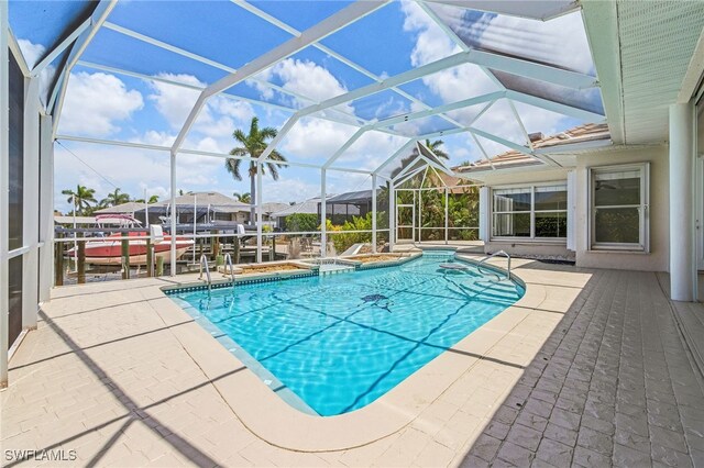 1207 SW 52nd Ter, Cape Coral, FL 33914 - swimming pool with a patio area and a lanai