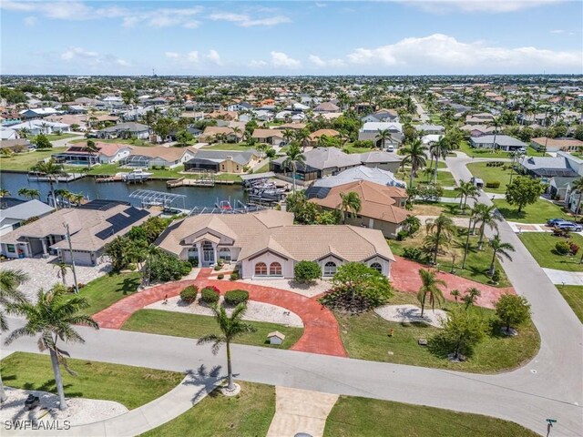 1207 SW 52nd Ter, Cape Coral, FL 33914 - aerial perspective of suburban area featuring a large body of water