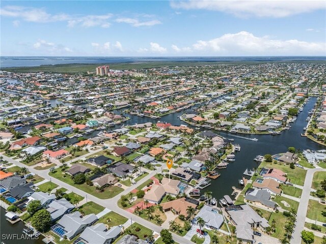1207 SW 52nd Ter, Cape Coral, FL 33914 - view of property location with a large body of water and nearby suburban area