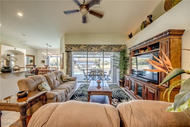 3914 SW 17th Ave, Cape Coral, FL 33914 - living room featuring tile patterned flooring, ceiling fan with notable chandelier, lofted ceiling, and visible vents