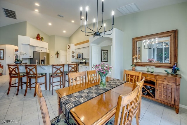 3914 SW 17th Ave, Cape Coral, FL 33914 - dining room with arched walkways, light tile patterned floors, visible vents, and a notable chandelier