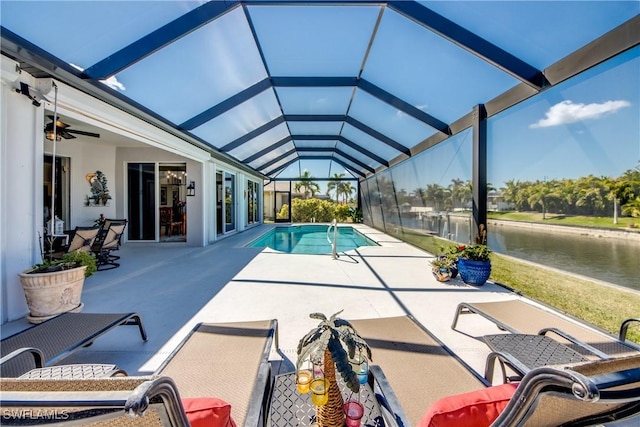 3914 SW 17th Ave, Cape Coral, FL 33914 - pool featuring a water view, ceiling fan, a lanai, and a patio area