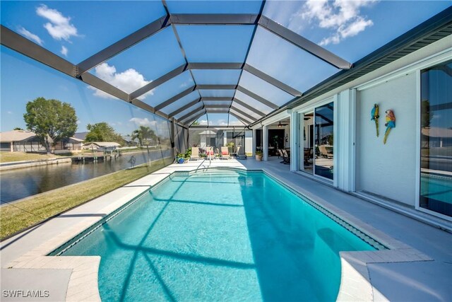 3914 SW 17th Ave, Cape Coral, FL 33914 - outdoor pool featuring glass enclosure and a patio