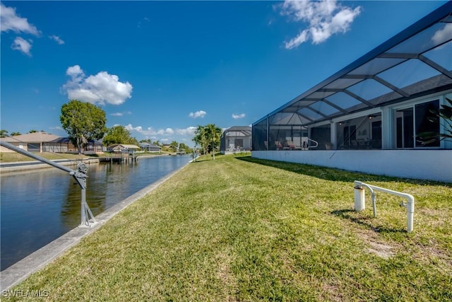 3914 SW 17th Ave, Cape Coral, FL 33914 - view of yard featuring glass enclosure and a water view