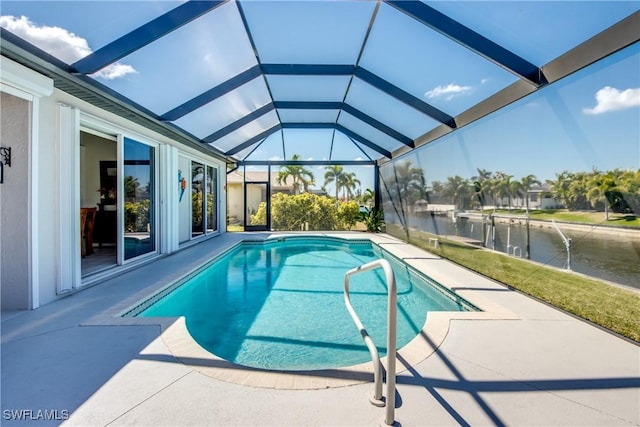 3914 SW 17th Ave, Cape Coral, FL 33914 - outdoor pool with glass enclosure, a water view, and a patio area